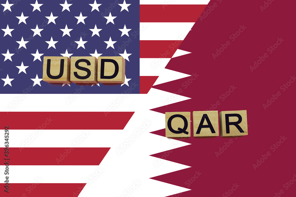Fototapeta premium USA and Qatar currencies codes on national flags background