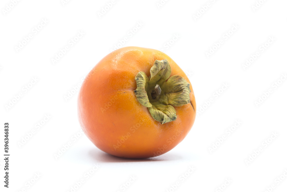 Closeup of organic Kaki on white background Closeup of organic Kaki on white background