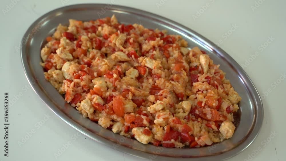 Djuvec Composing Of Chicken, Tomatoes And Rice In Big Oval Plate - Static, Close Up Djuvec Composing Of Chicken, Tomatoes And Rice In Big Oval Plate - Static, Close Up