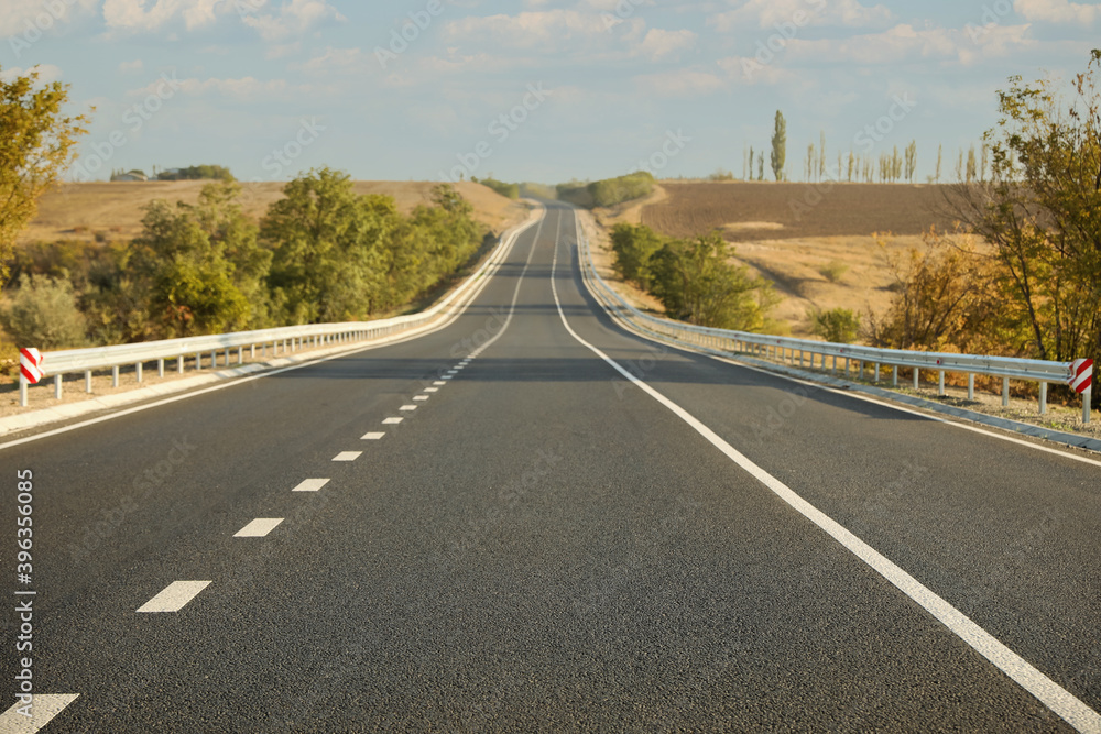 Fototapeta premium Beautiful view of empty asphalt highway. Road trip