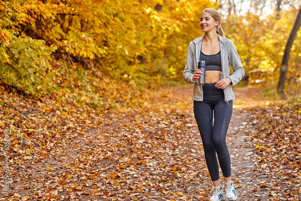 caucasian beautiful woman running in the forest, engaged in sport, run in the morning outdoors, enjoy caucasian beautiful woman running in the forest, engaged in sport, run in the morning outdoors, enjoy