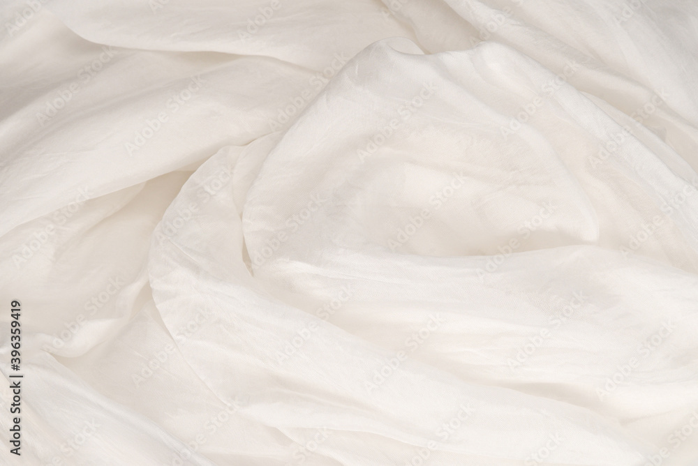 Soft smooth white silk fabric background. Fabric texture. Soft smooth white silk fabric background. Fabric texture.