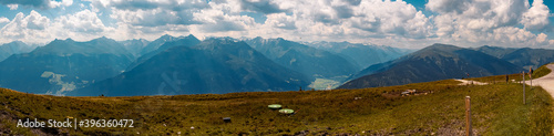 High resolution stitched panorama of a beautiful alpine summer view with the Hohe Tauern mountains at the famous Panoramabahn Kitzbueheler Alpen, Salzburg, Austria photo