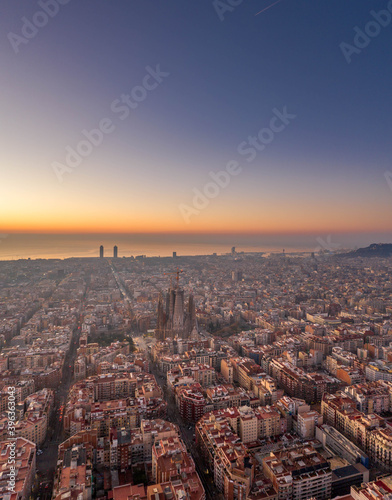 Photography Aerial drone shot of Barcelona city before sunrise golden hour
