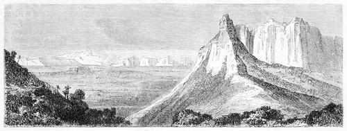 horizontal arranged view of Le Pouce mountain, Mauritius, on a huge flat landscape. Ancient grey tone etching style art by Trichon and Hadamard, Le Tour du Monde, 1861 photo
