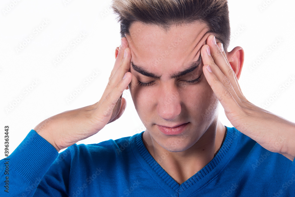 Headache and migraine. Young man. White background. Headache and migraine. Young man. White background.