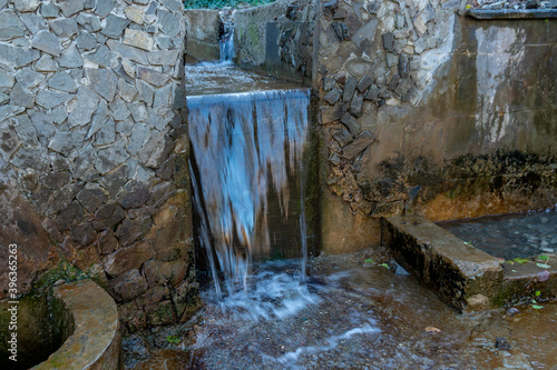 Handmade waterfall in the mtatsminda garden, Tbilisi photo