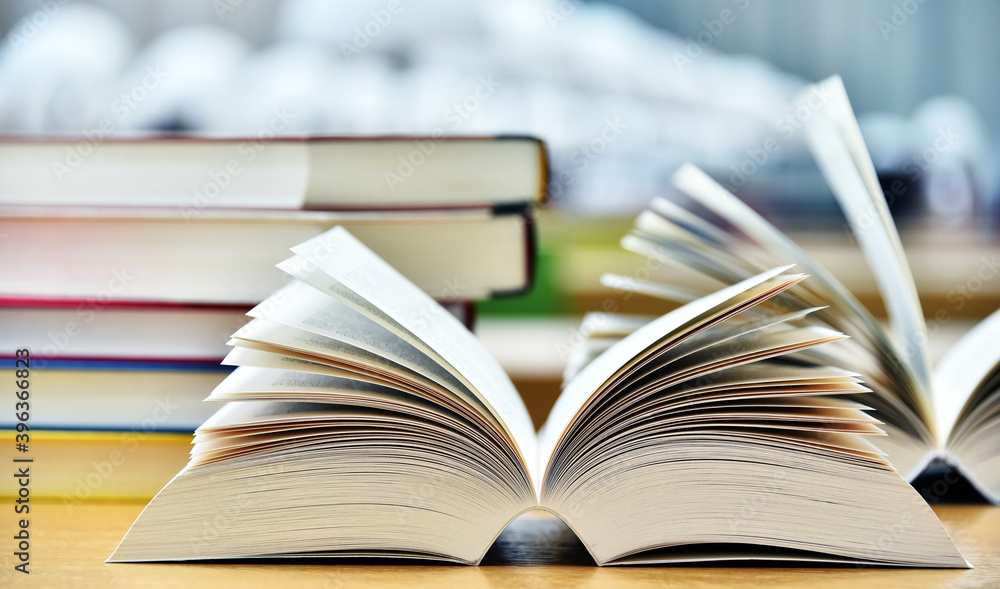 Books lying on the table in the public library