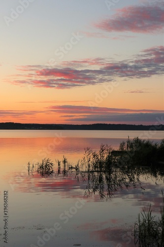 Fototapeta Naklejka Na Ścianę i Meble -  Orange idyllic sunset over the lake. Sunset collection. 