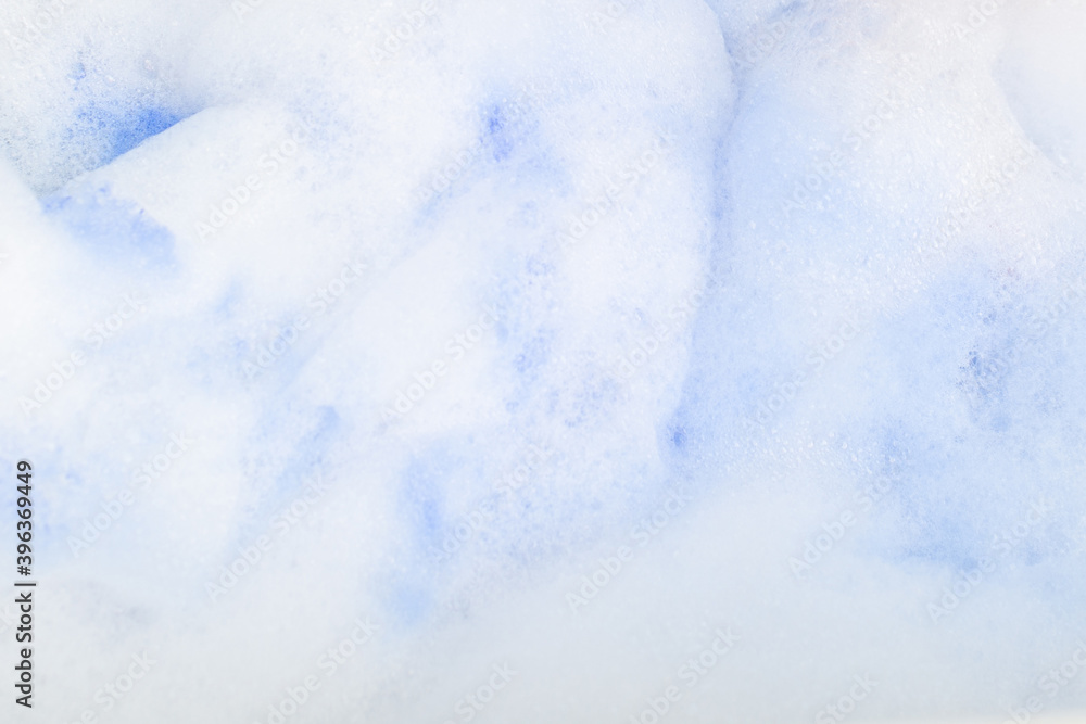 Soapy foam with blue paint. Can be used as a background.