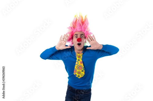 Young funny clown. Weekends and vacations. White background.