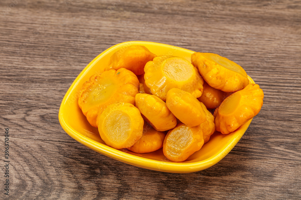 Marinated yellow patisson in the bowl Marinated yellow patisson in the bowl