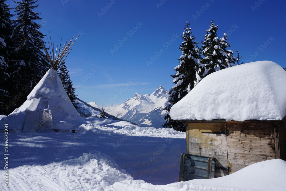 teepee and ski hut on the slopes of a French ski resort in the Alps