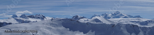 panoramic of the French Alps mountains in winter with the Mont Blanc on a fabulous day on the ski slopes of Flaines © poupine