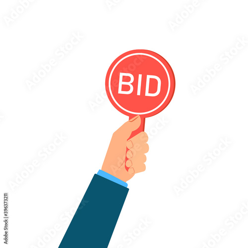 Hand holding auction paddle bid. Clipart image