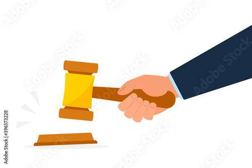 Hand holding gavel or auction hammer clipart image