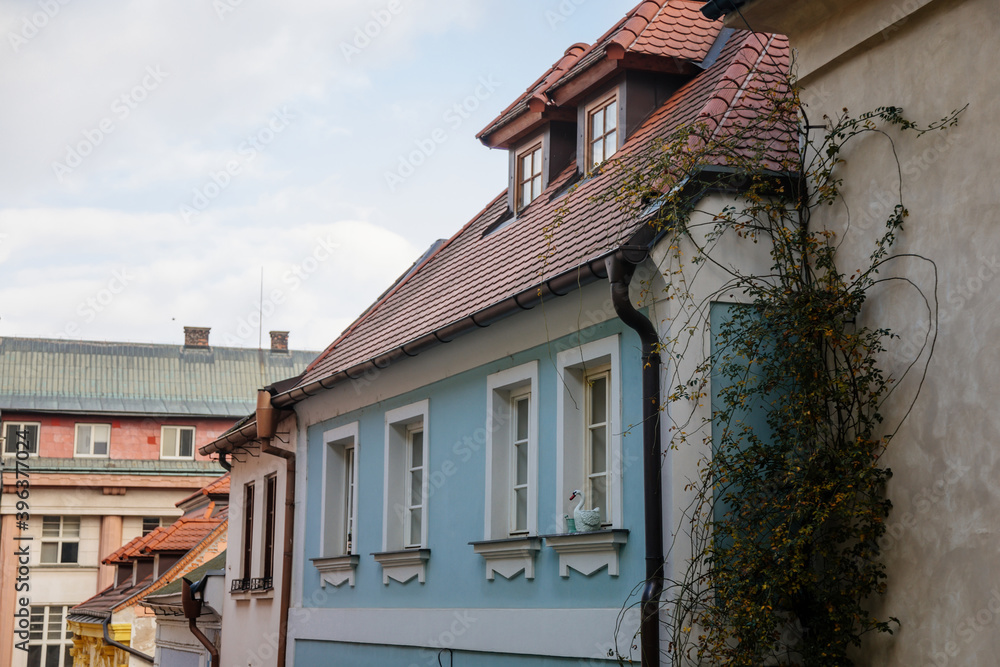 Narrow picturesque street with colorful buildings in old historic center of Kolin, Central Bohemia, Czech Republic