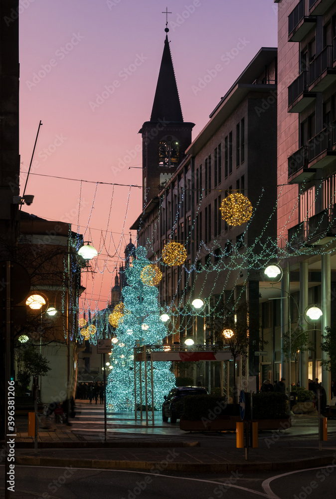 Christmas lights come on at sunset in the city center.stunning city decorations in December