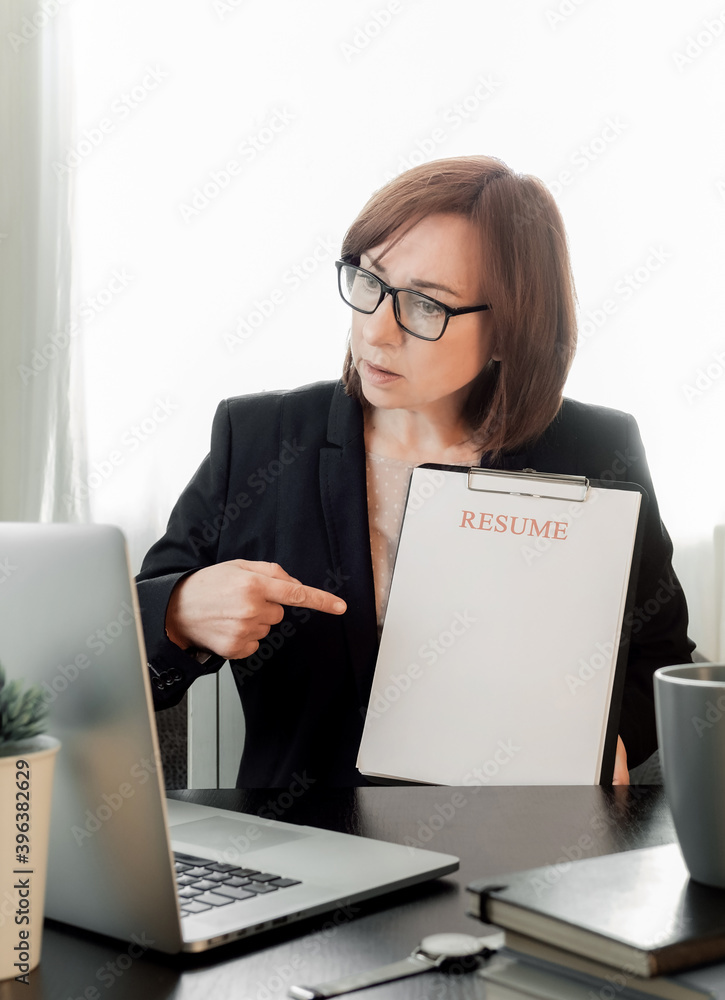 laptop resume hand woman workplace blank cv application upset laptop resume hand woman workplace blank cv application upset