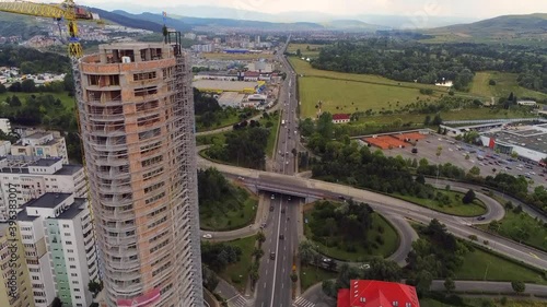 Cluj-Napoca,Cluj/Romania-07.20.2019:West City Tower Cluj-Napoca,the tallest building in Cluj county, is built in Manastur,at the exit to Floresti. It will have 25 floors,182 apartments,95 meters  photo