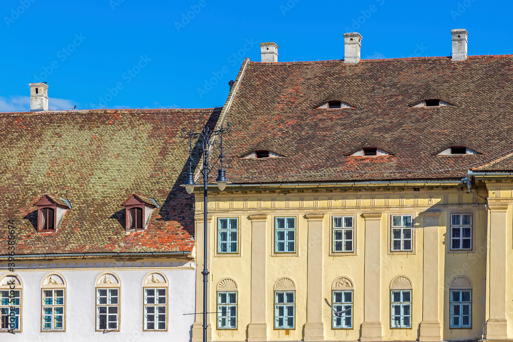 Fototapeta premium Roofs with windows like eyes, Sibiu, Transylvania, Romania