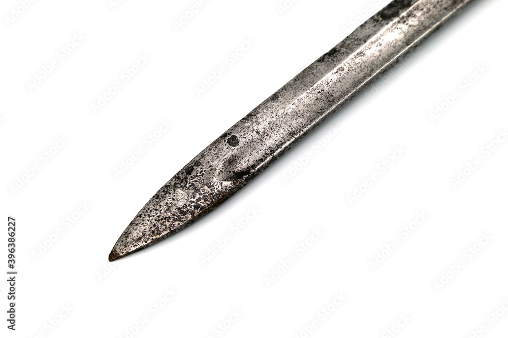 Obraz premium the edge of an antique blade on a white background