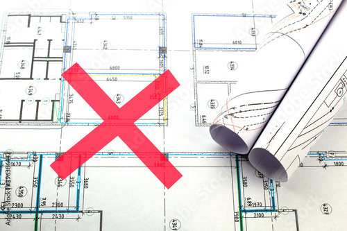Construction line crossed out by a red marker, construction ban or design error.