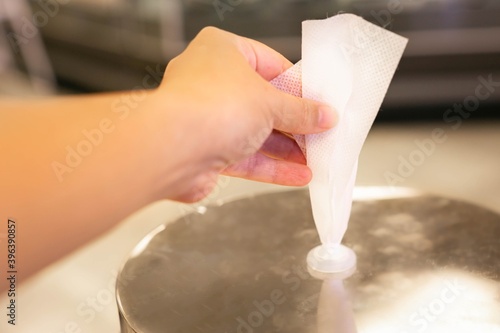 Wallpaper Mural A customer grabbing a anti bacterial wipe in the grocery store. Hygiene safety and sanitation. Torontodigital.ca