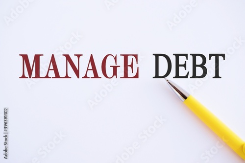 Writing note showing Manage Debt. Business photo showcasing unofficial agreement with unsecured creditors for repayment. © Julia