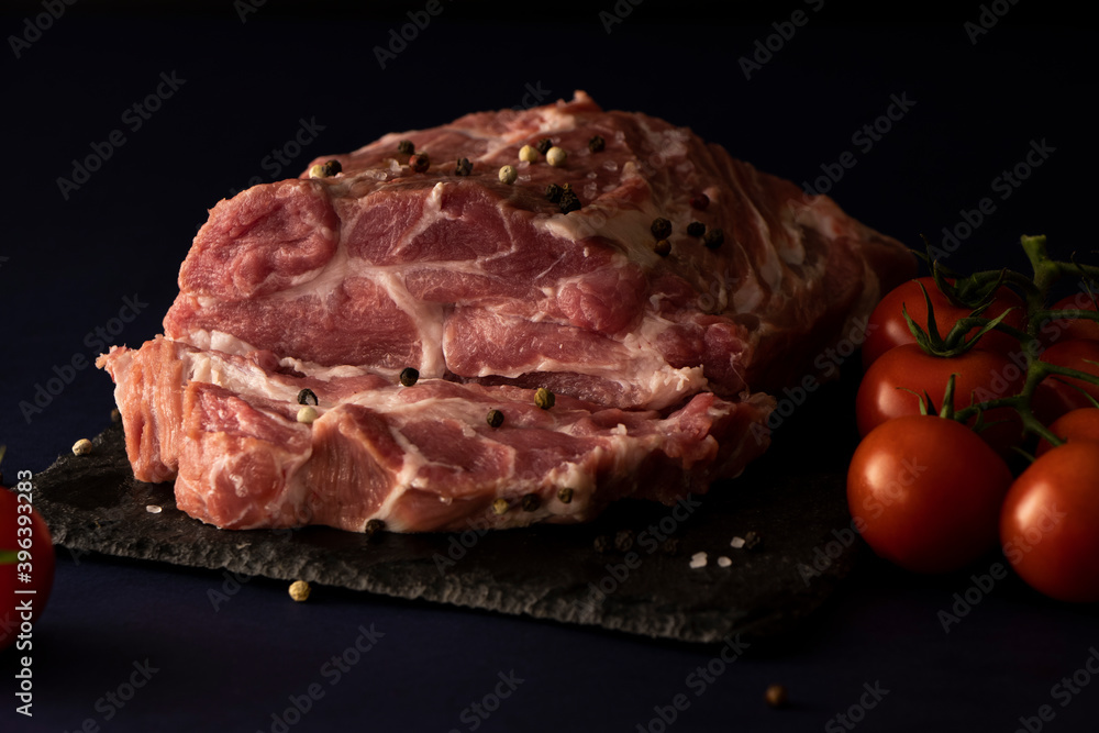 pork, fresh meat with spices and salt on black. raw steak, tenderloin with tomatoes. semi-finished meat. dish ingredient
pork, fresh meat with spices and salt on black. raw steak, tenderloin with tomatoes. semi-finished meat. dish ingredient