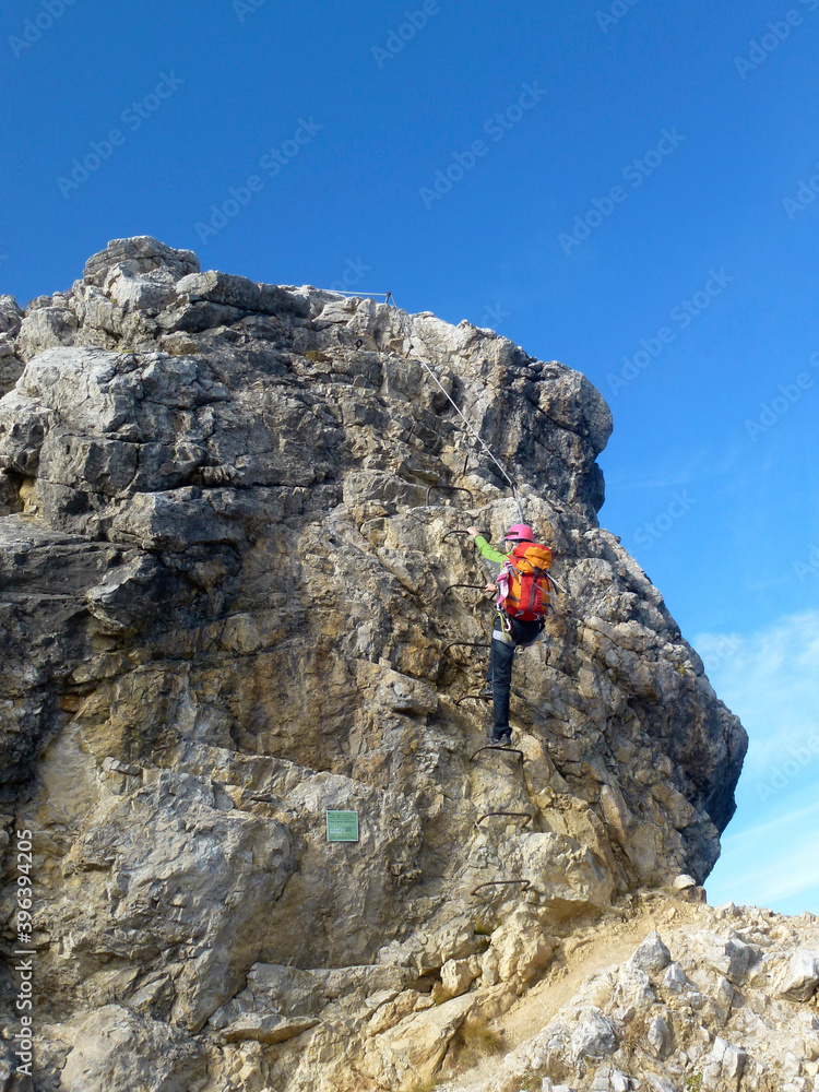 Climber at Mindelheim via ferrata mountain tour, Allgau, Germany