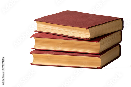  Three red old books on white background
