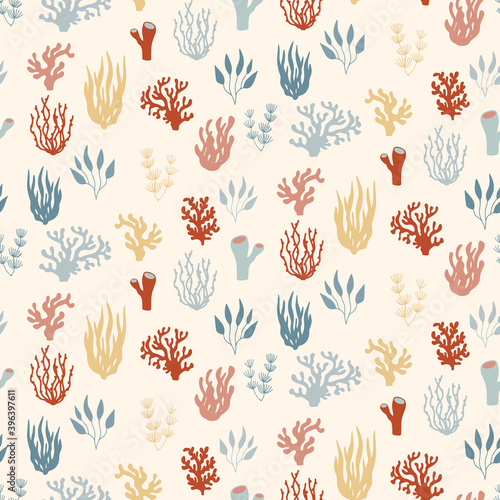 Seamless marine pattern of underwater plants and coral reefs. Red and blue nautical background with seaweeds in hand drawn sketch style