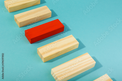 the concept of individuality in the form of wooden blocks
