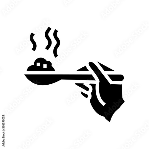 hand holding oatmeal on spoon glyph icon vector. hand holding oatmeal on spoon sign. isolated contour symbol black illustration