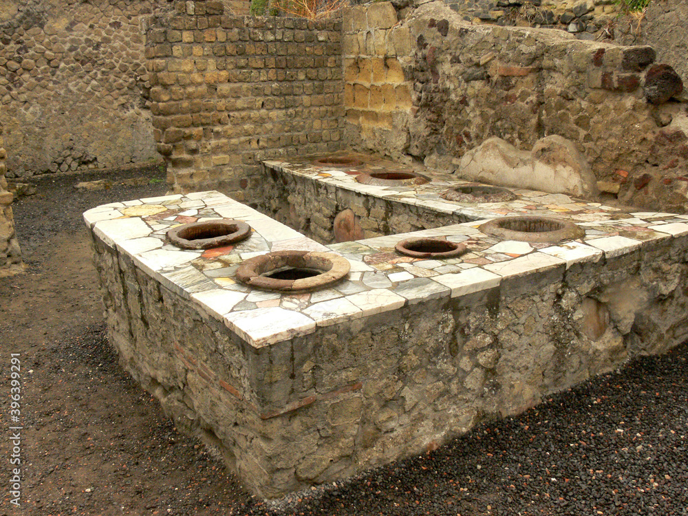 Ruins of a public bar in Roman Herculaneum, Italy