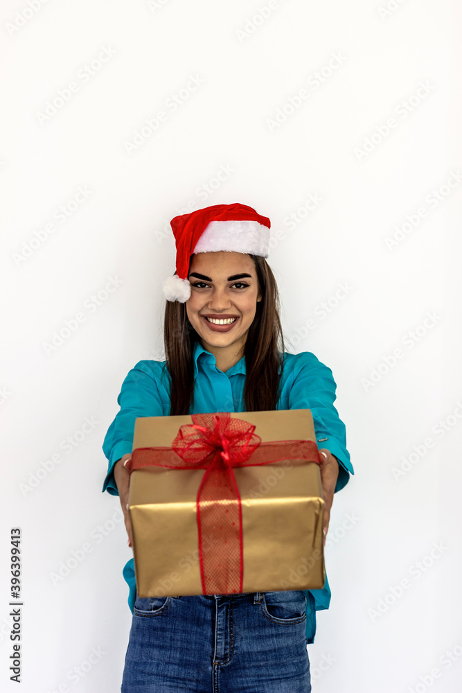 appy woman holding a gift box isolated on white background. Portrait of cheerful Caucasian holding a wrapped gift. Portrait of young lovely sweet girl lady, wearing green top, carrying gift box. appy woman holding a gift box isolated on white background. Portrait of cheerful Caucasian holding a wrapped gift. Portrait of young lovely sweet girl lady, wearing green top, carrying gift box.