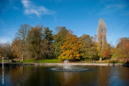 A fountain in a lake in Christchurch Park, Ipswich, UK