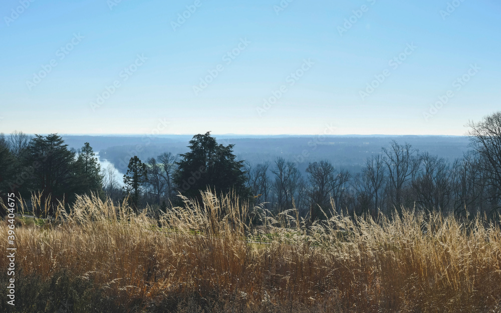 misty morning plano view of the mountains and river