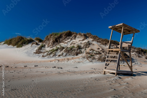Unmanned lifeguard station beside the dunes and empty beaches due to Covid-19 related lack of tourism to the North Carolina Outer Banks