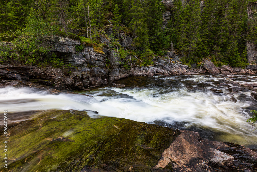 Beautiful landscape with stream and waterfall in Norway Beautiful landscape with stream and waterfall in Norway