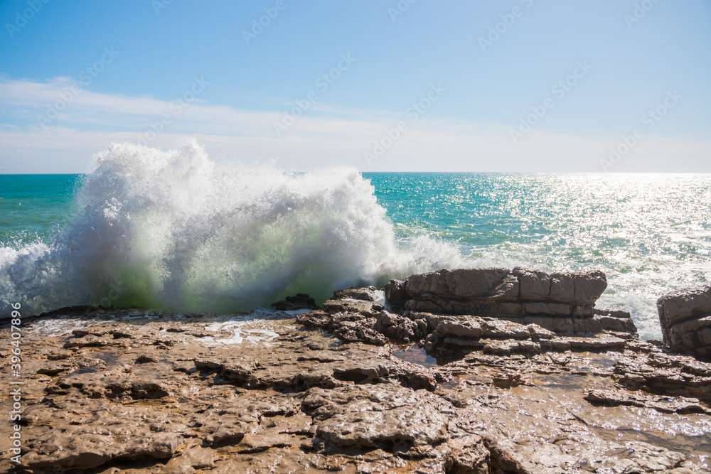 Beautiful waves crashing against the shore. Sunny summer day with a wild ocean. Impressive and spectacular photography.
Perfect desktop background.