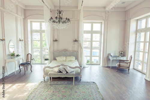 beautiful white bright clean interior bedroom in luxurious baroque style. © 4595886