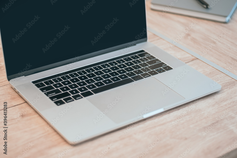 close up. stylish laptop on the table. close up. stylish laptop on the table.