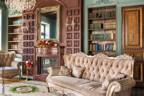 Luxury interior of home library. Sitting room with elegant furniture