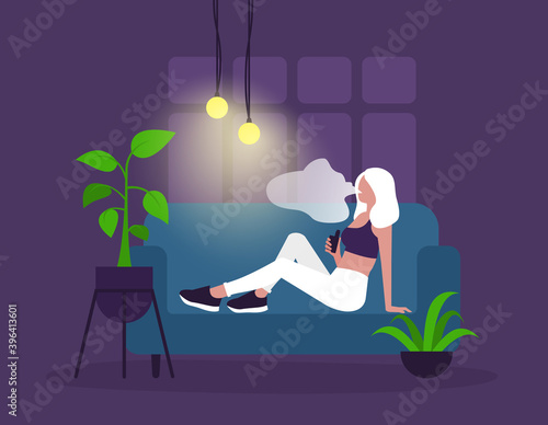 Vape. Young woman smoking a vape in dark room. Lifestyle.