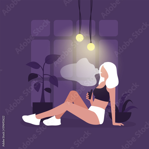 Vape. Young woman smoking a vape in dark room. Lifestyle.