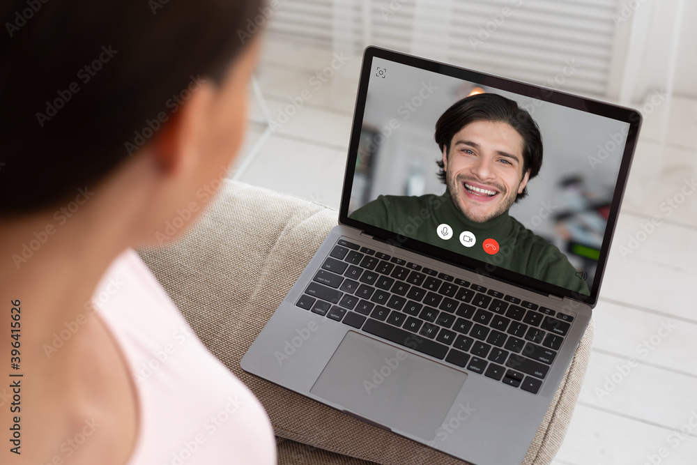 Wife Making Video Call On Laptop Calling Husband At Home Wife Making Video Call On Laptop Calling Husband At Home