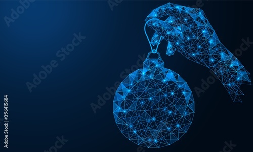 Christmas ball in hand. Christmas tree decoration for the holiday. Polygonal construction of concatenated lines and points. Blue background.