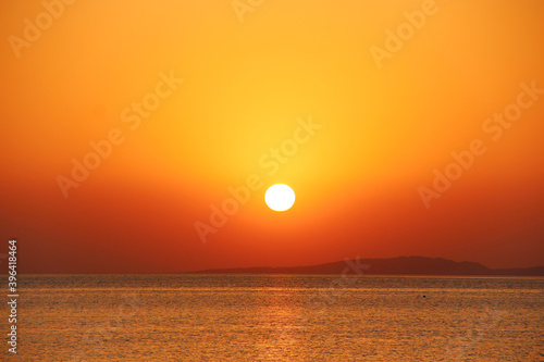 Fototapeta Naklejka Na Ścianę i Meble -  Sunset above sea. Beautiful summer decline above ocean
